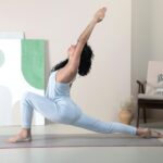 집에서 즐기는 필라테스, 건강한 일상으로 가는 스마트 습관 a woman doing a yoga pose in a room