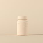 영양제, 똑똑하게 먹는 법—‘내게 맞는’ 루틴이 건강을 지킨다 a bottle of medicine sitting on top of a table